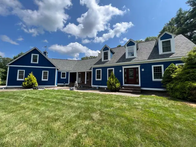 Exterior repaint of a colonial home by Sharp Painting