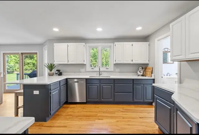 Refinished kitchen cabinetry by Sharp Painting